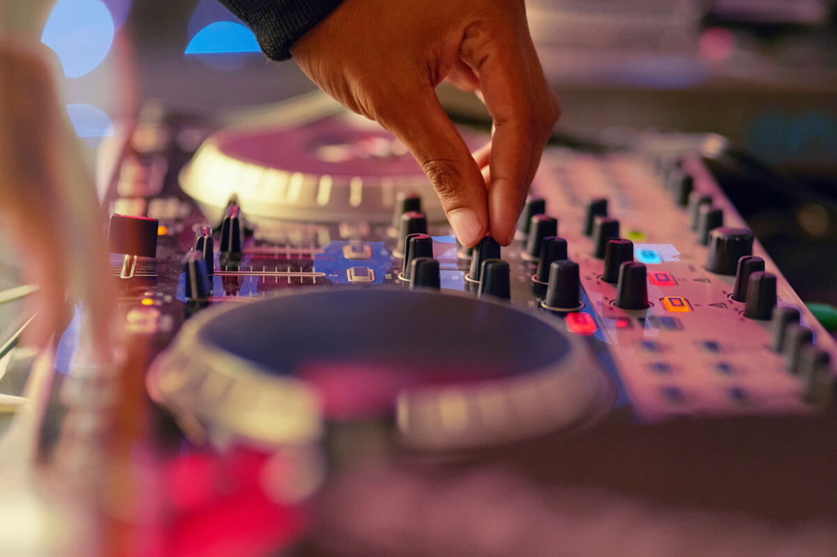 Professional DJ vs. Friend with a Playlist: What’s the Right Choice for Your Wedding?